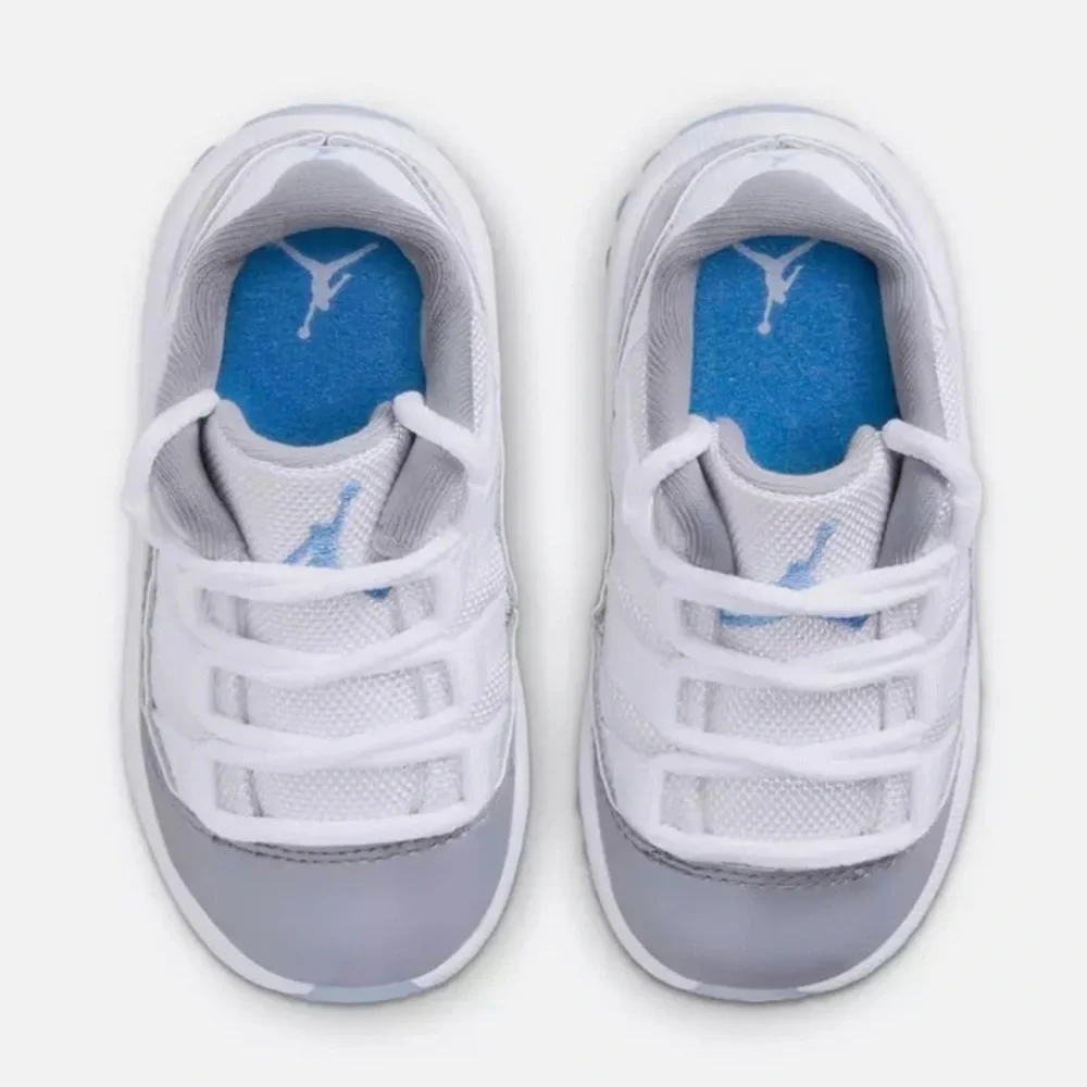 NWOT Nike Kids Air Jordan Retro 11 Low - Grey and White with Ice Blue Sole